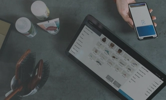 aerial view of a hand with a mobile phone